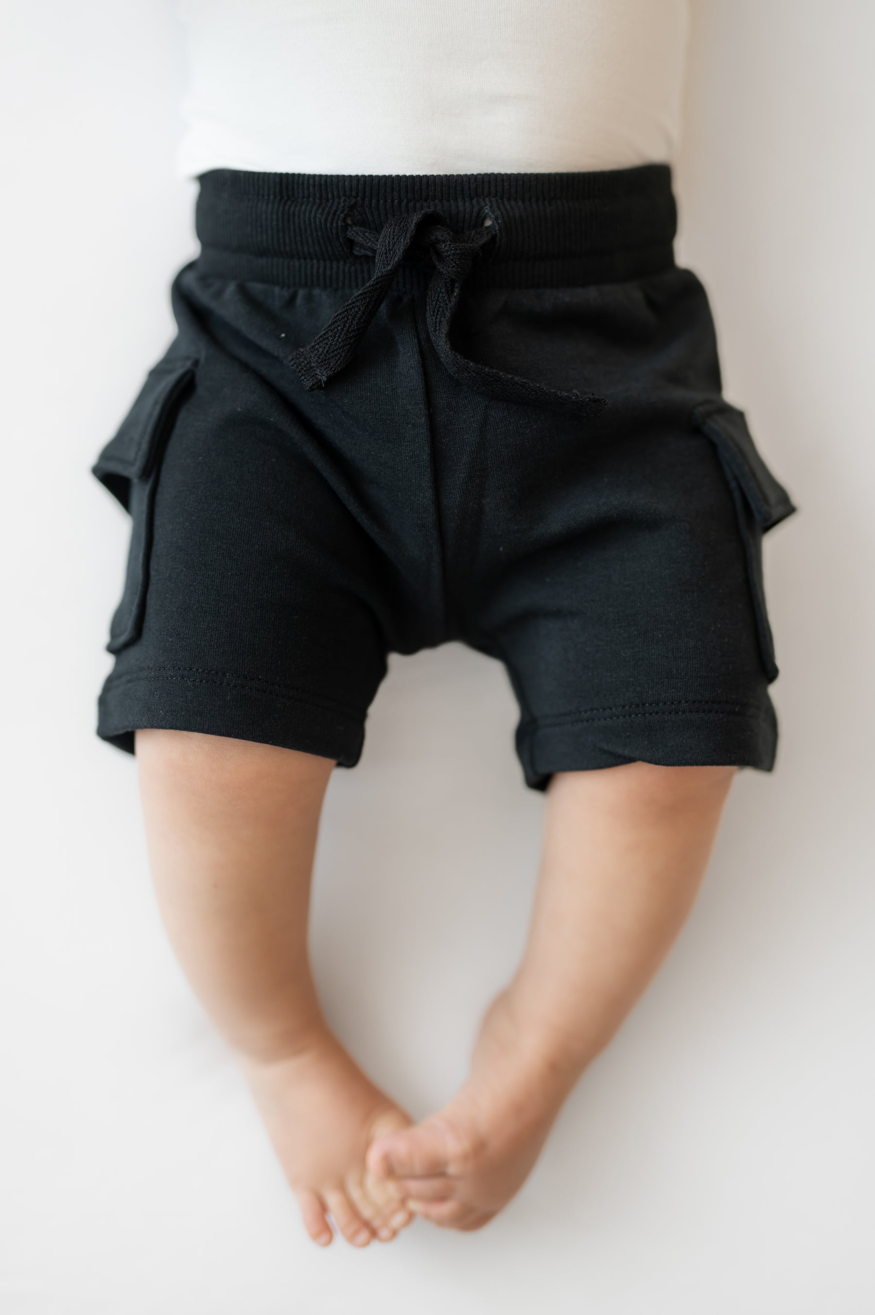 Cargo Short in Midnight shown on an infant