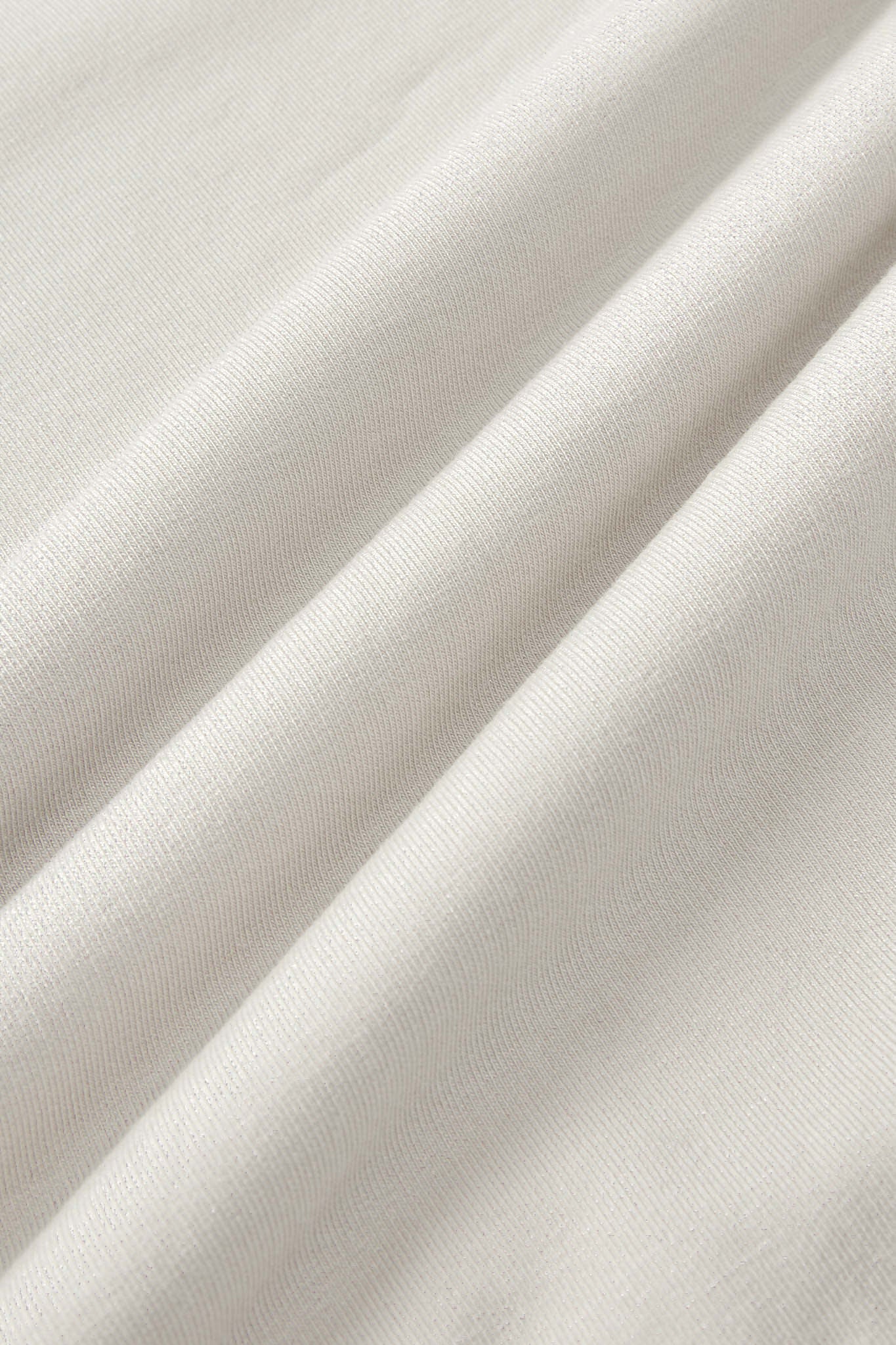 Close up image of oat color fabric
