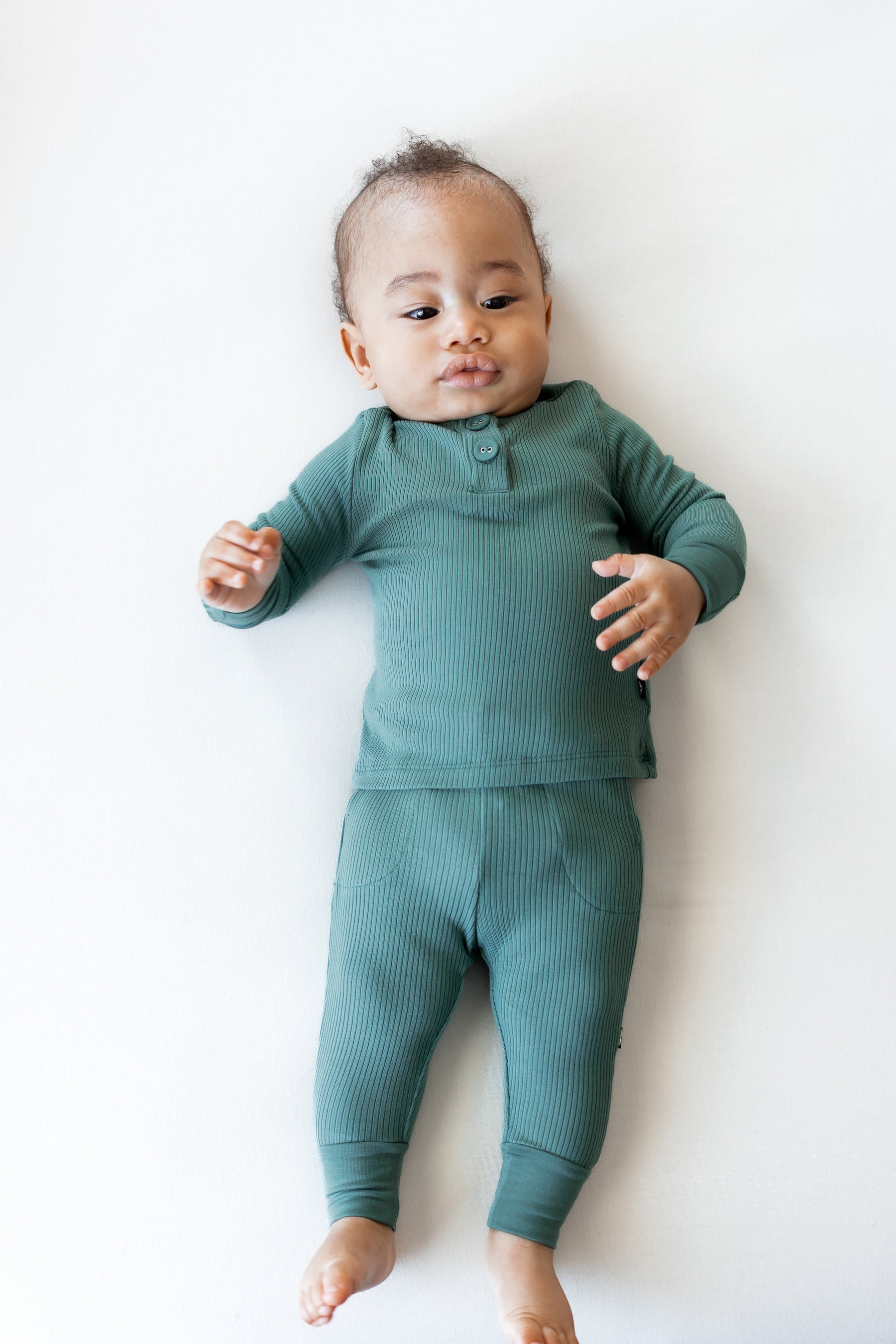 Baby wearing Ribbed Infant Henley Set in Pine on a white background