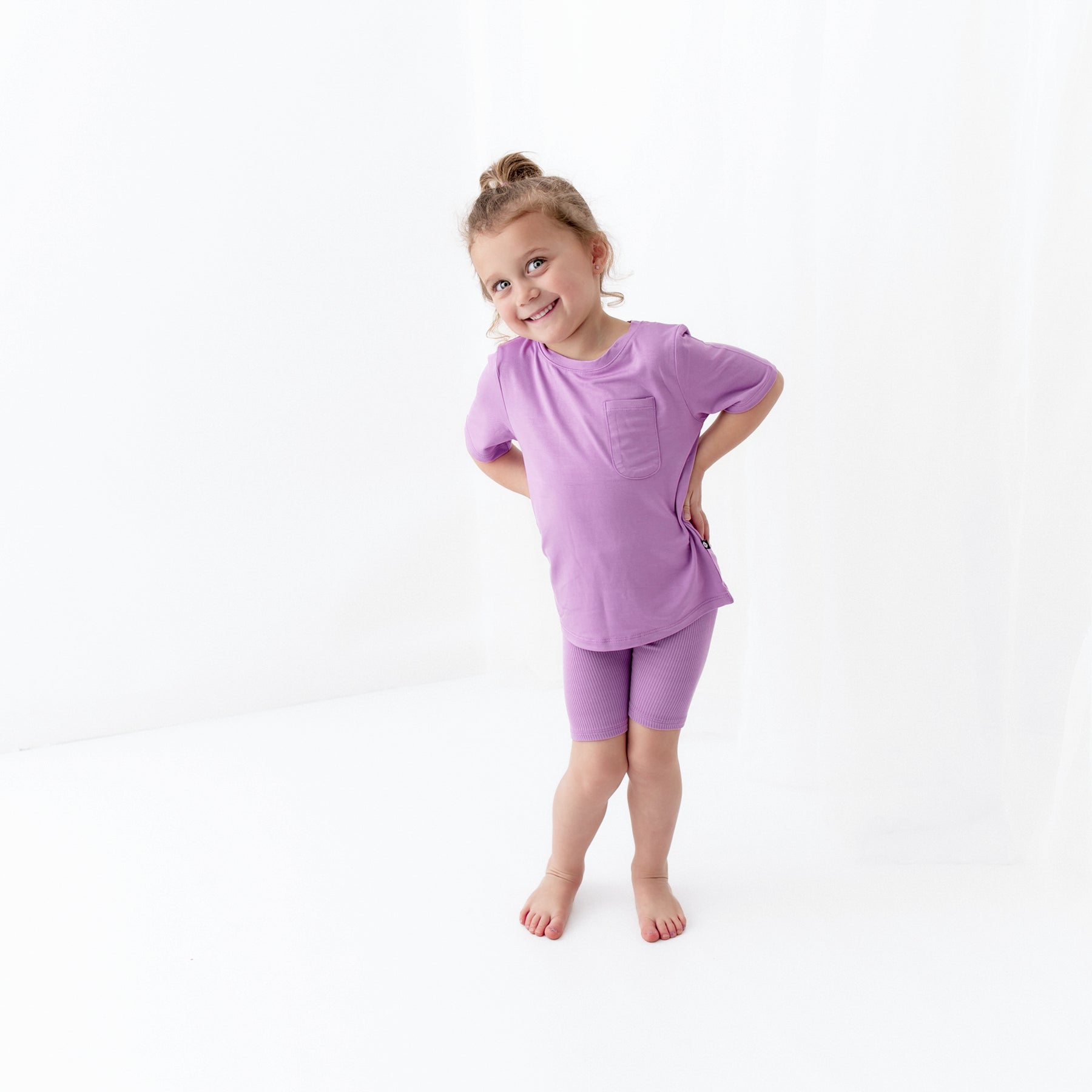 Girl wearing Toddler Crew Neck Tee in Poi with Matching shorts