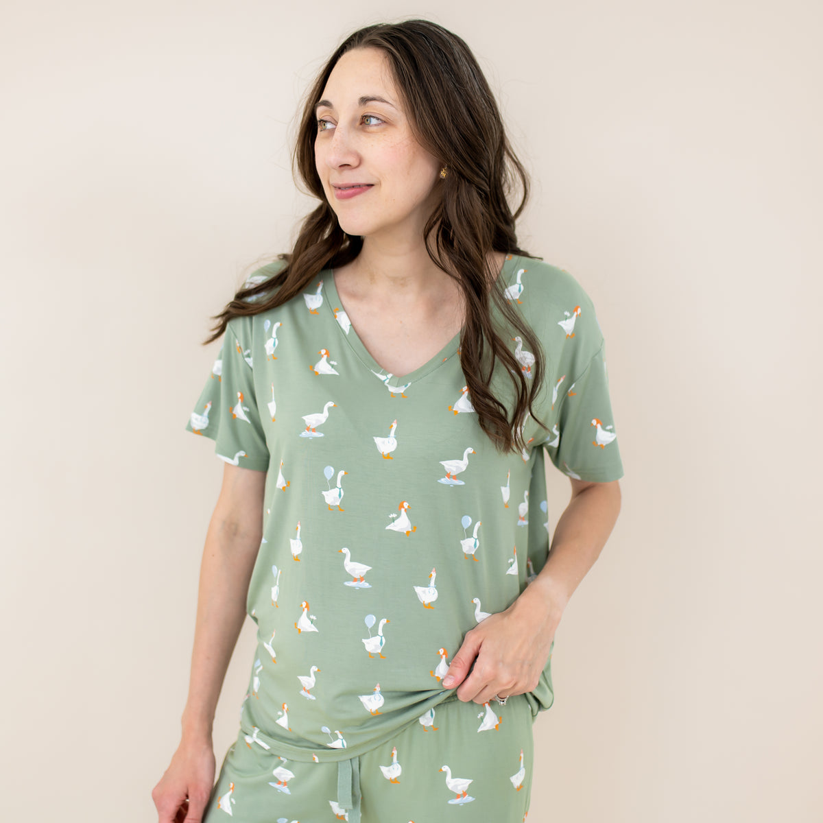 Close up of the Women's Relaxed Fit V-Neck in Silly Goose shown on a female model