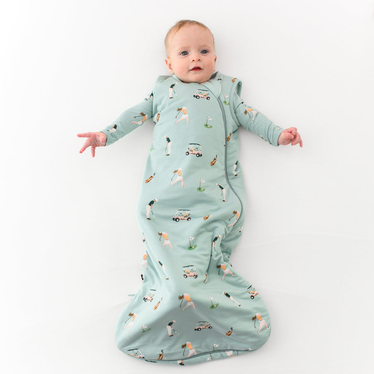 Baby wearing 1.0 Sleep Bag in Golf 