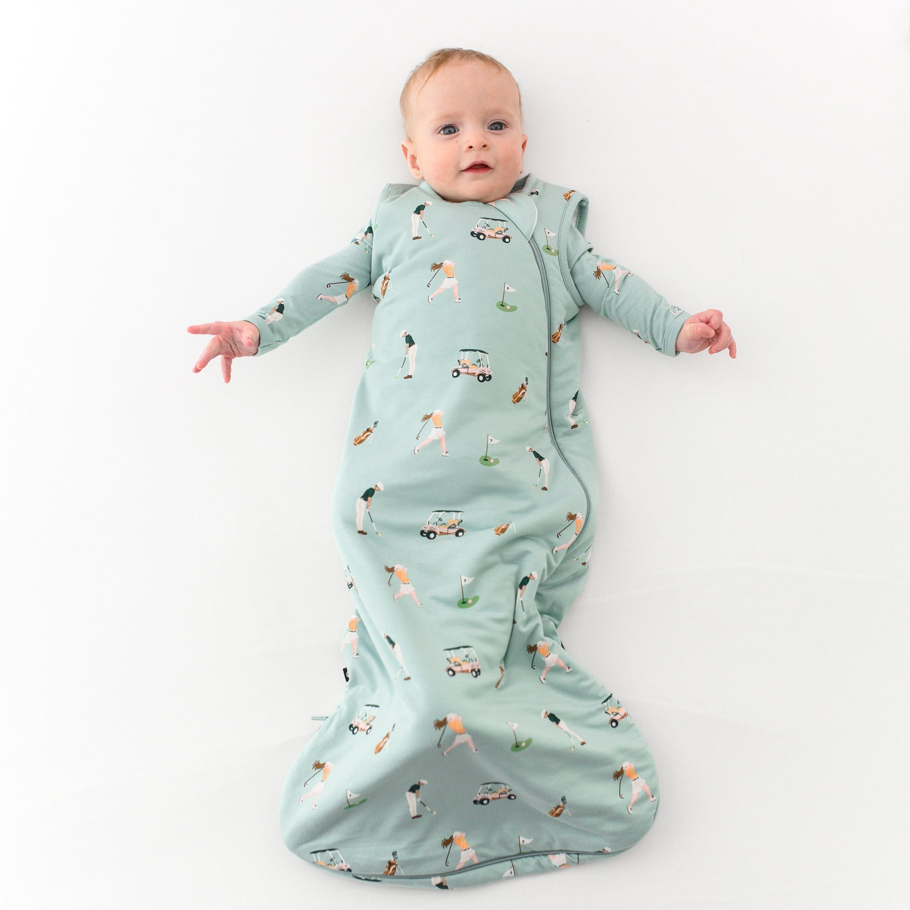 Baby wearing 1.0 Sleep Bag in Golf 