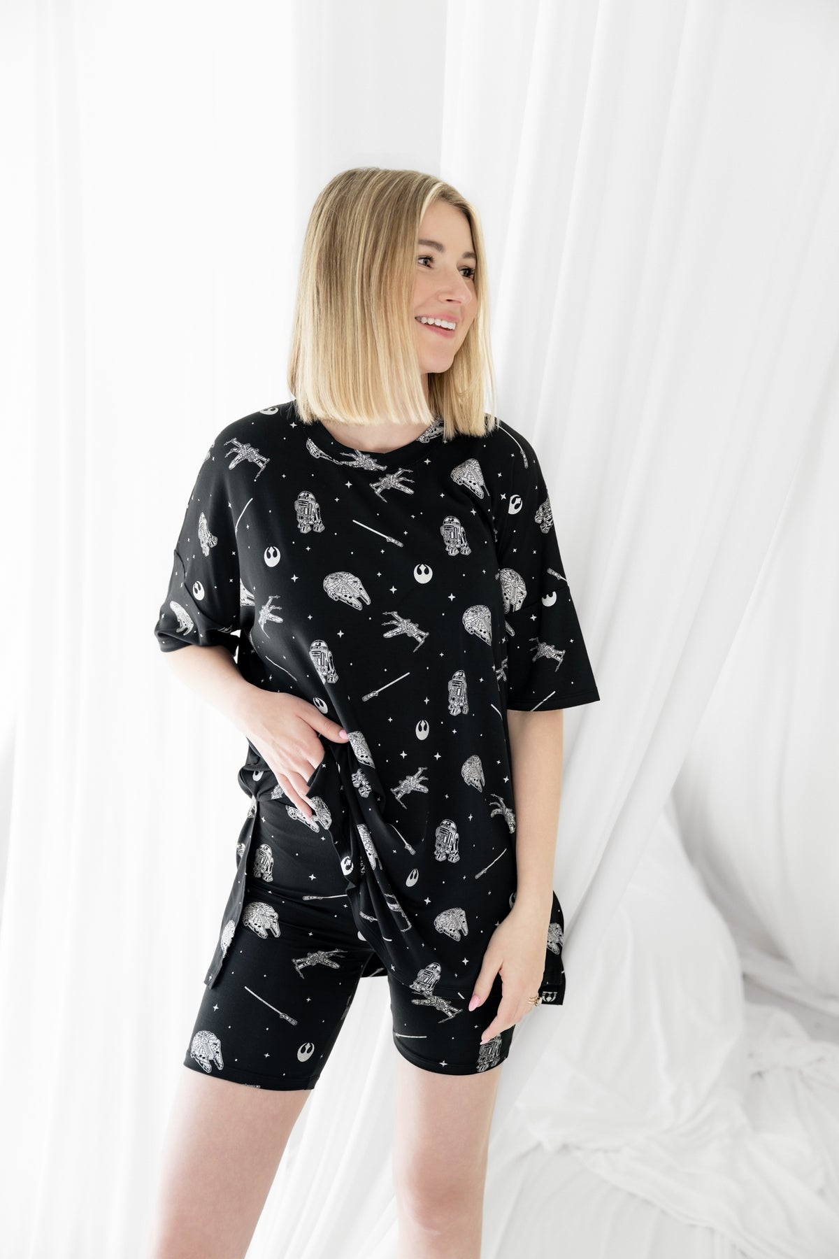 Female modeling the Women’s Biker Short Set in STAR WARS™ in front of a white background
