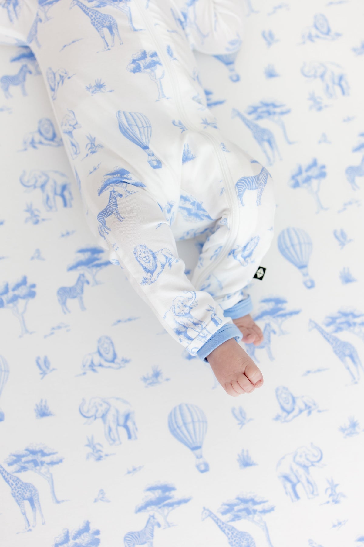 The zipper closure on the leg of the Zippered Romper in Toile Safari