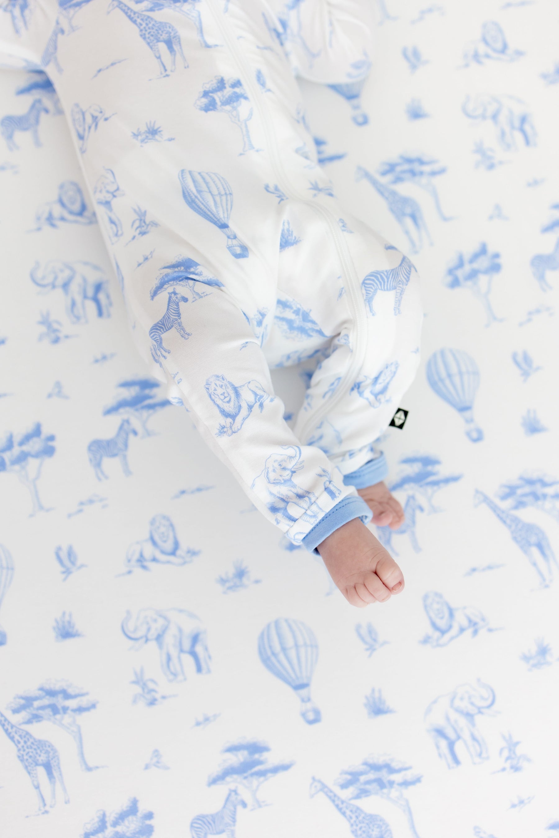 The zipper closure on the leg of the Zippered Romper in Toile Safari