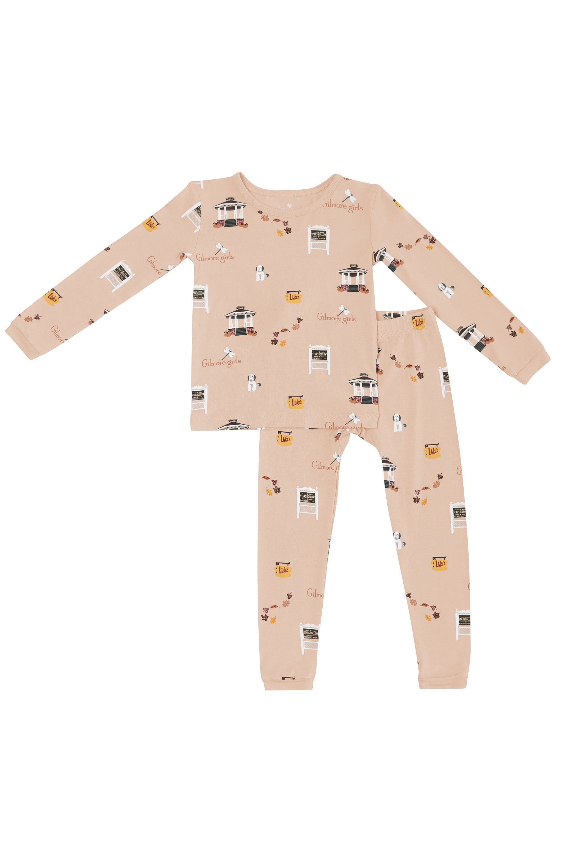 A two-piece baby pajama set featuring a long-sleeve top and matching pants in a light peach-beige color, printed with a Gilmore Girls pattern 