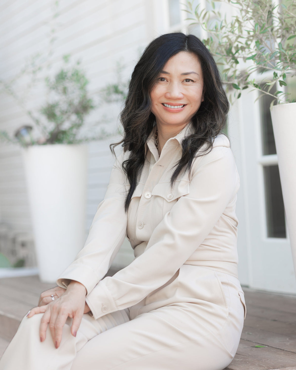Kyte Baby founder, Ying, posed on an outdoor patio 