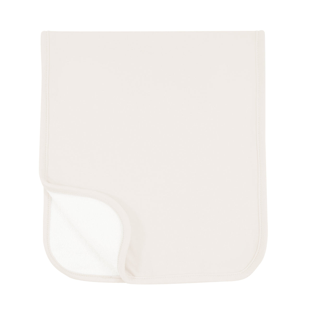 Burp Cloth in Oat folded in half with one corner folded showing terry side