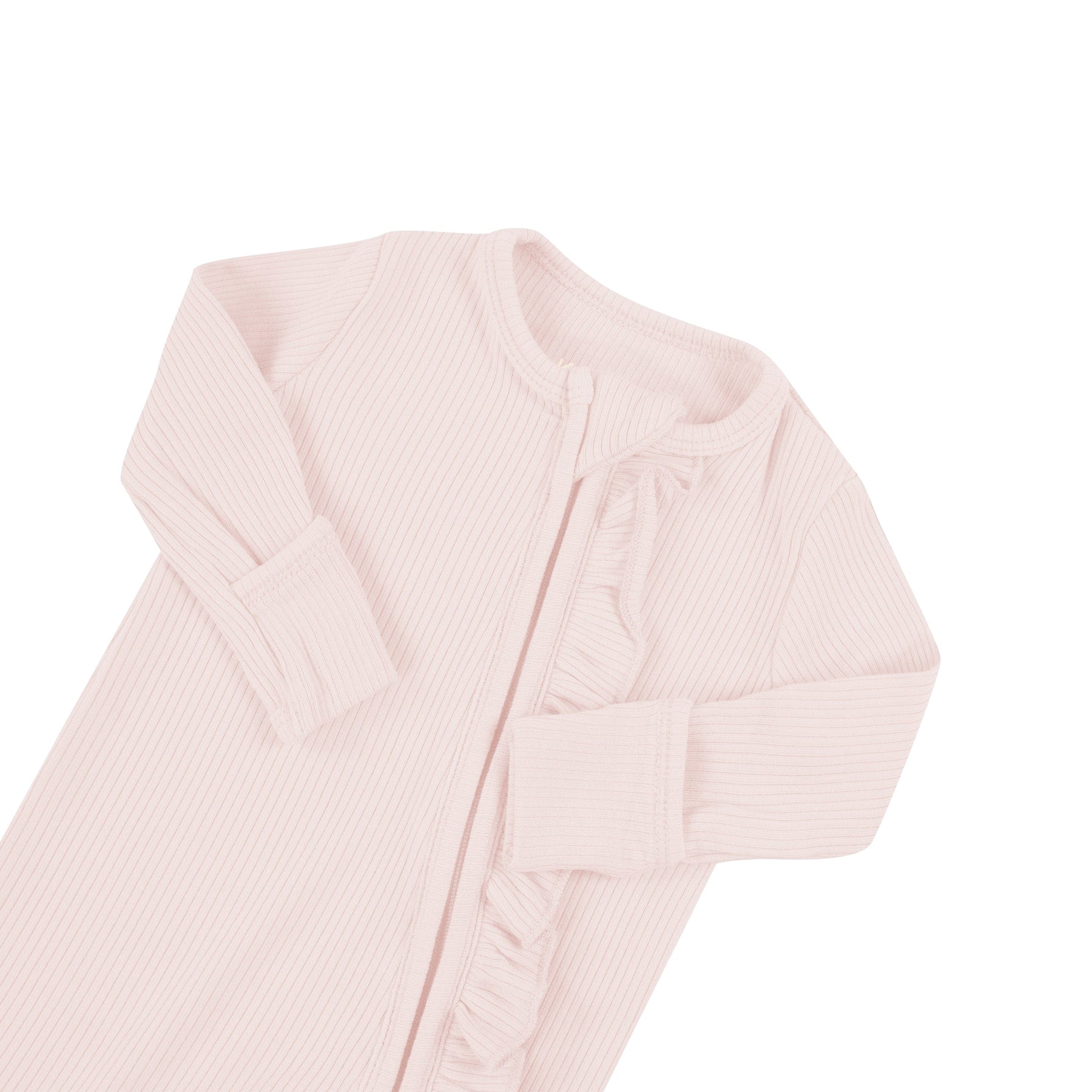 Fold-over cuffs on Kyte Baby Ribbed Ruffle Zippered Footie in Blush pink