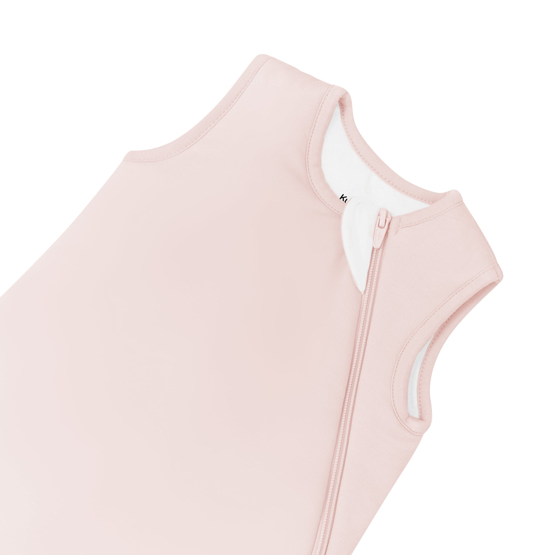 Close up of zipper garage on Kyte Baby Sleep Bag in Blush 2.5