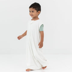Child model walking wearing the Sleep Bag Walker in Cloud 0.5
