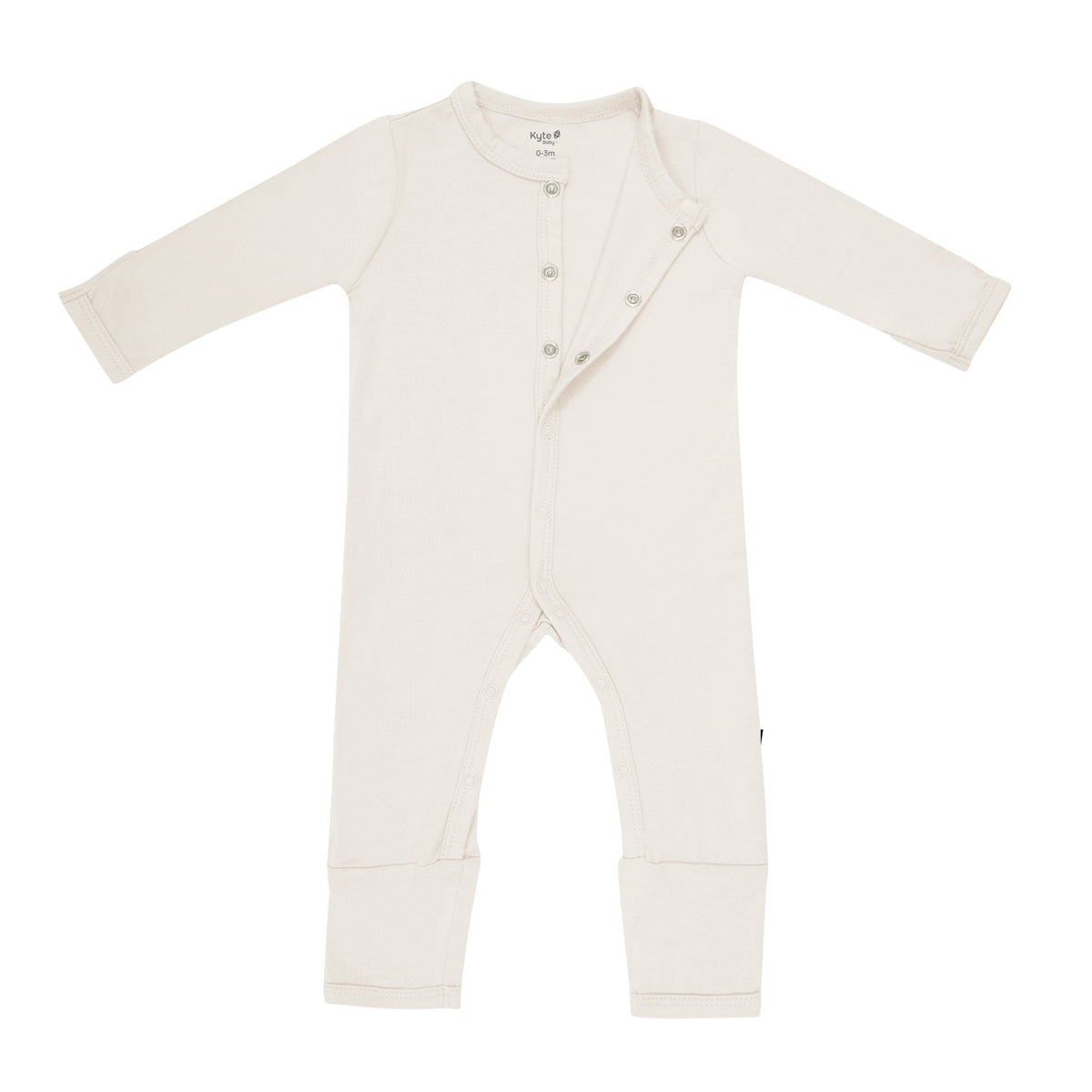 Kyte Baby Snap Romper in Oat unsnapped from the top