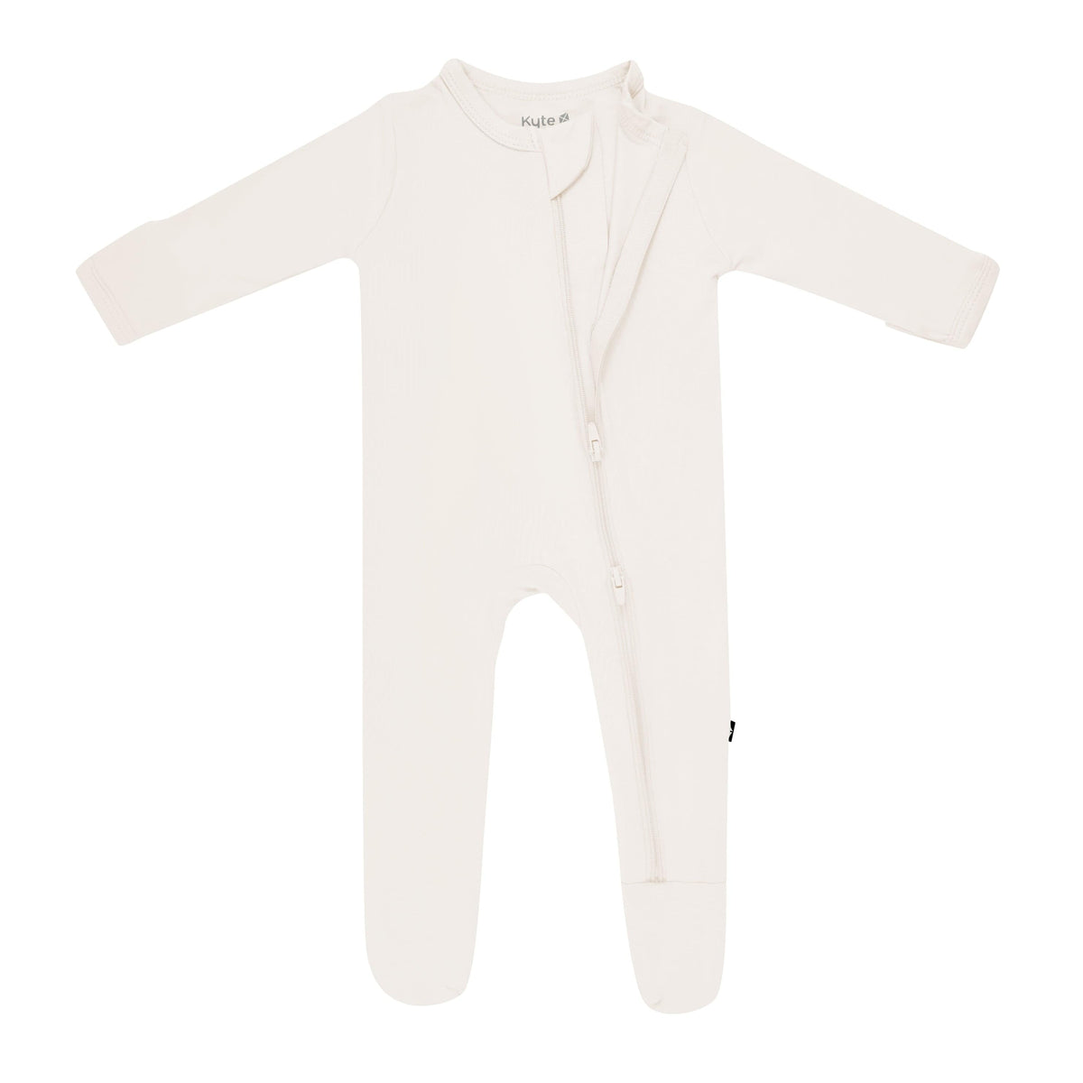 Dual zipper partially unzipped from the top on the Zippered Footie in Oat