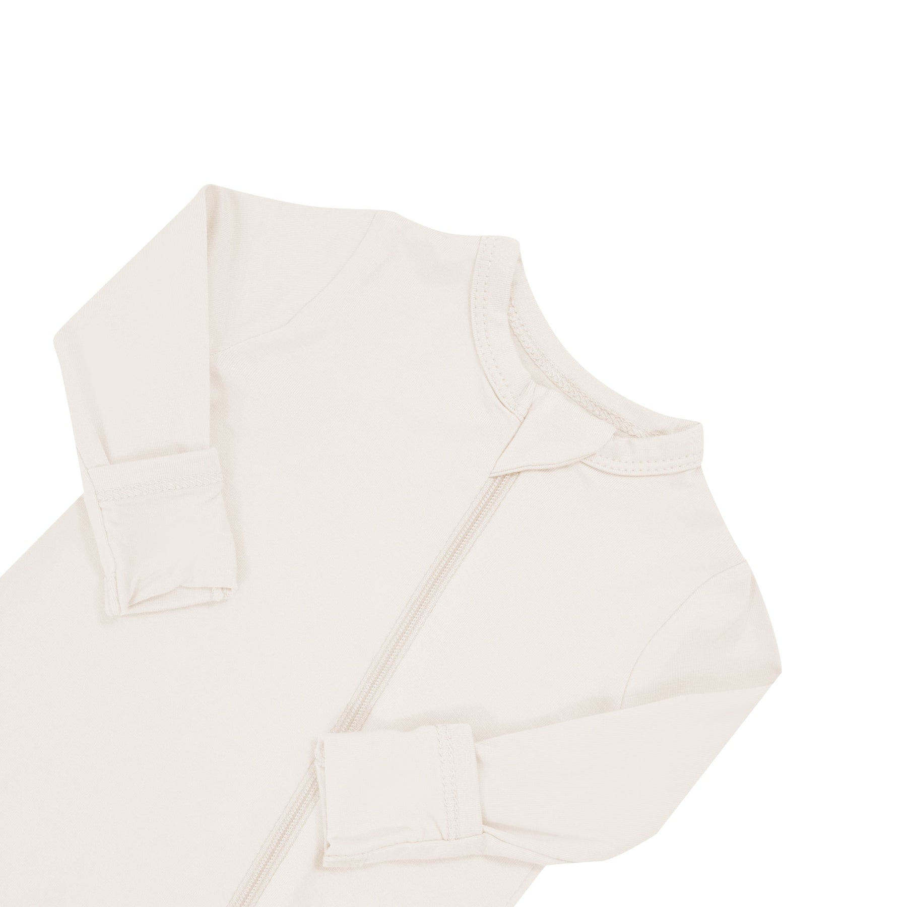 Close up of zipper garage on Kyte Baby  Zippered Romper in Oat