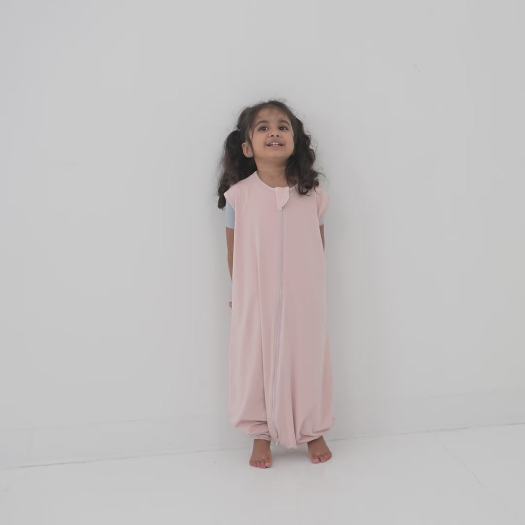 Video of young girl model wearing the Sleep Bag Walker in Blush 0.5