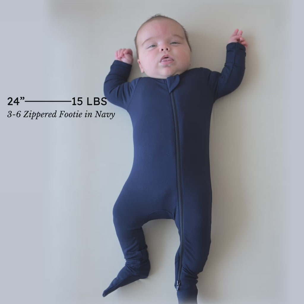 Video of baby wearing the Zippered Footie in Navy