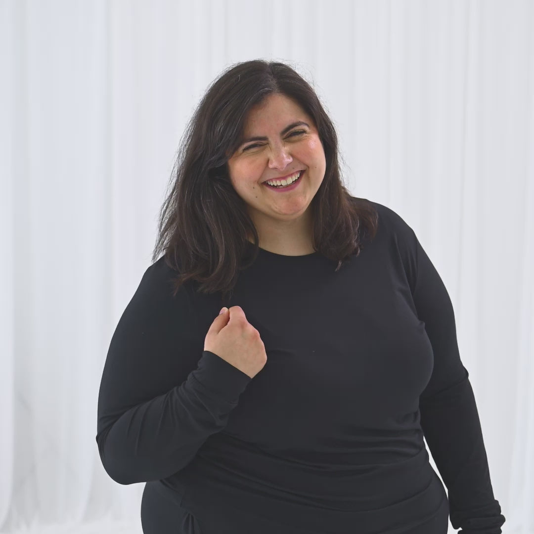 Video of Woman Wearing Black Jogger Pajamas