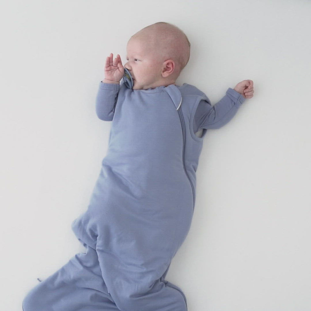 Video of baby wearing Kyte Baby Sleep Bag in Slate 2.5