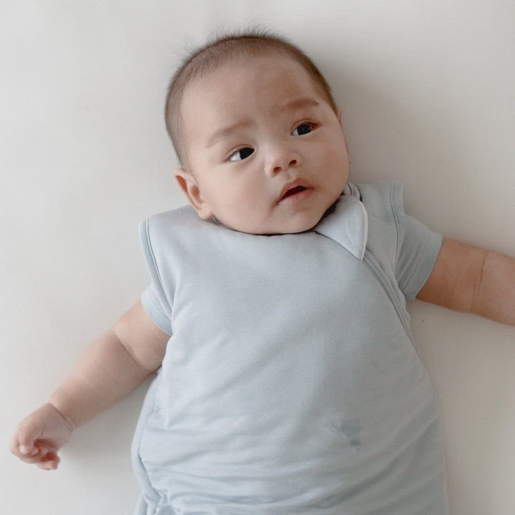Video of baby wearing Kyte Baby Sleep Bag in Fog 1.0