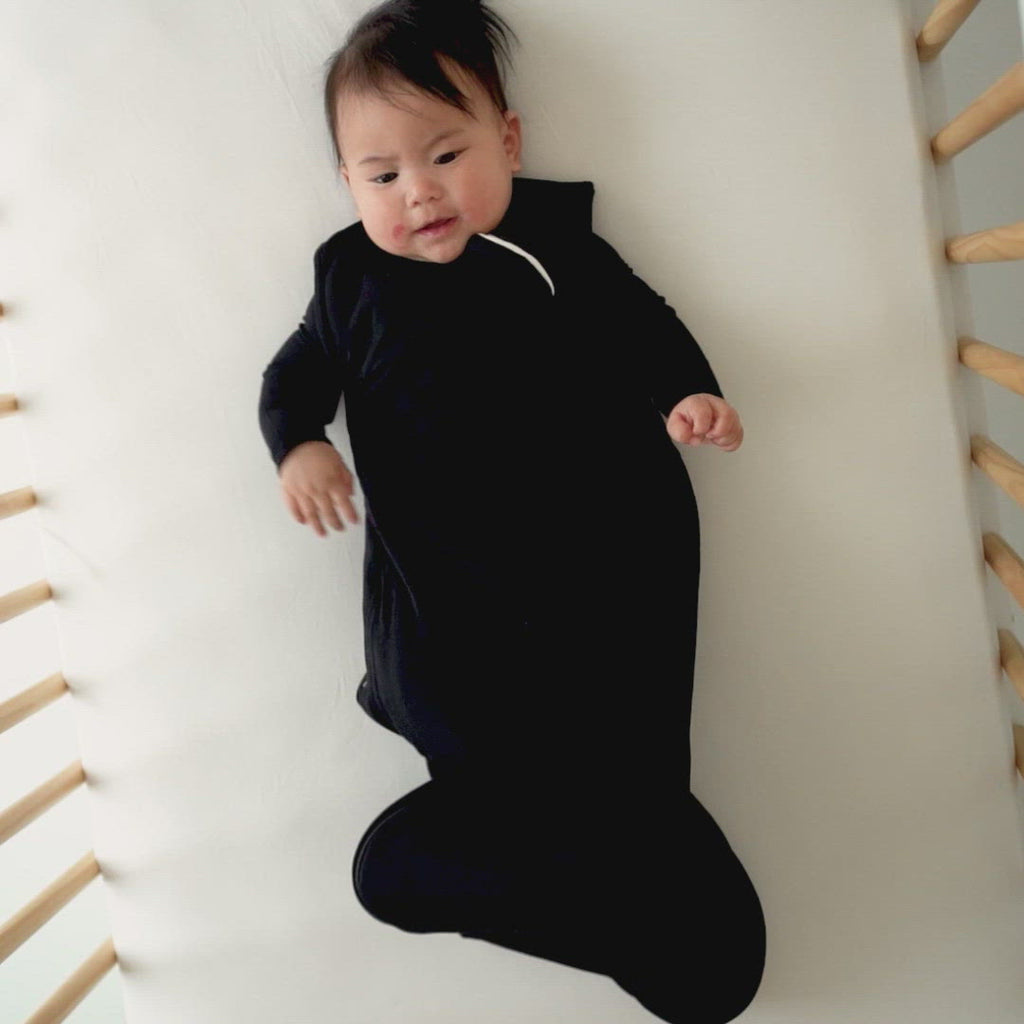 Video of baby wearing Kyte Baby Sleep Bag in Midnight 2.5