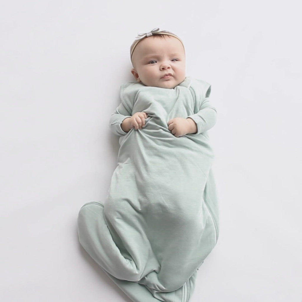 Video of baby wearing Kyte Baby Sleep Bag in Sage 2.5