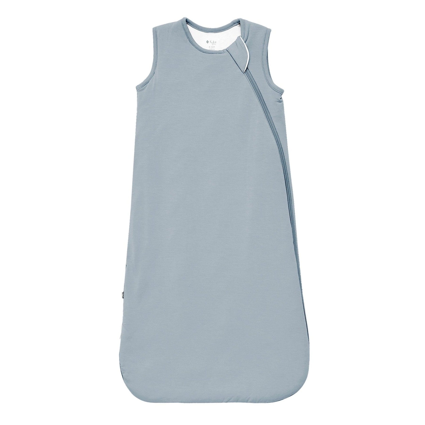 Flat lay of a Kyte Baby Sleep Bag in Fog 1.0