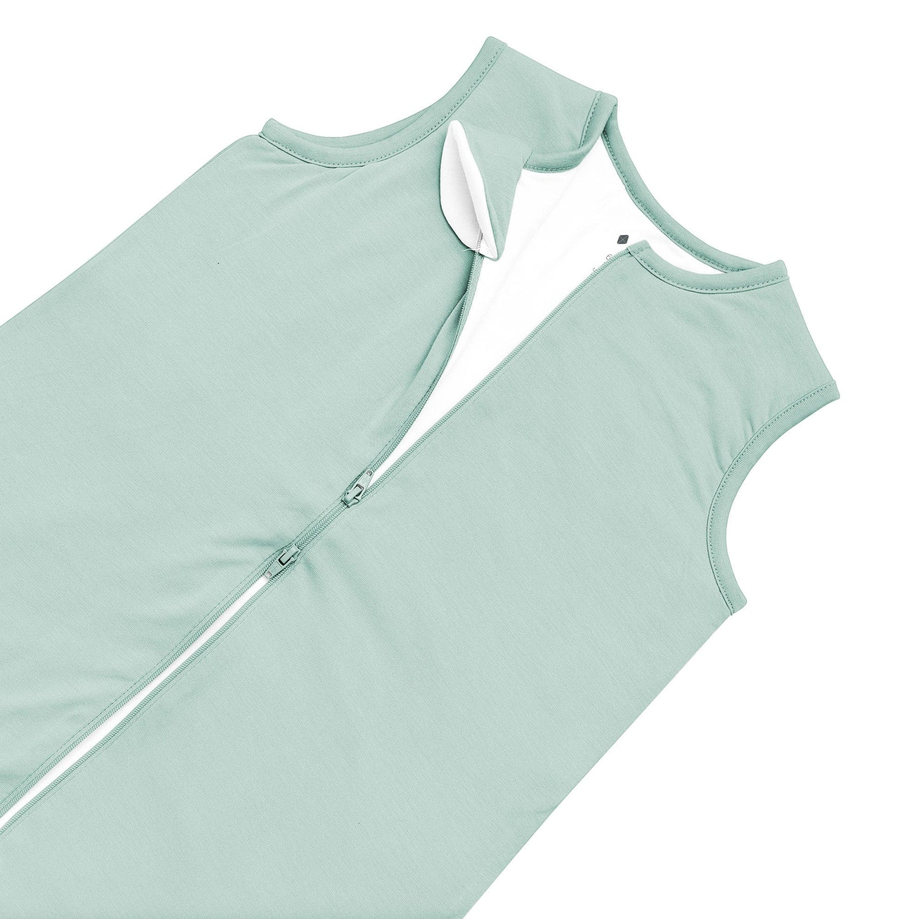 Close up of dual zipper on Kyte Baby Sleep Bag Walker in Sage 1.0