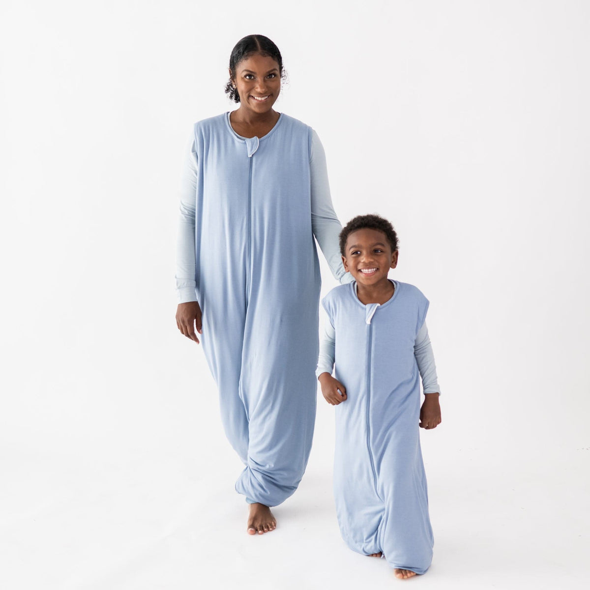 Mom and son in matching Kyte Baby TOG 1.0 bamboo Sleep Bag Walkers in Slate 